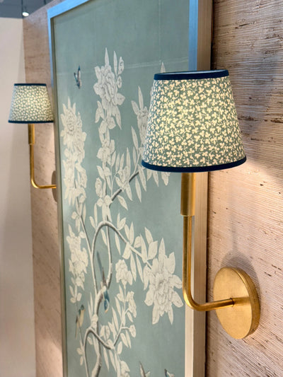 Ian Sanderson Blue Mineral Miss Polly Lampshade with Blue Cadet Trim on gold sconce 