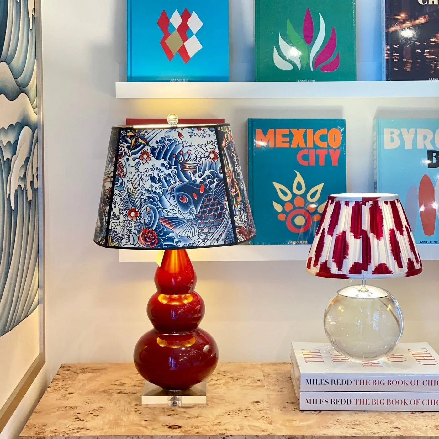 red lamp and wallpaper lampshade