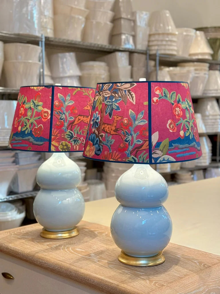 Kit Kemp lampshades on pale blue lamps