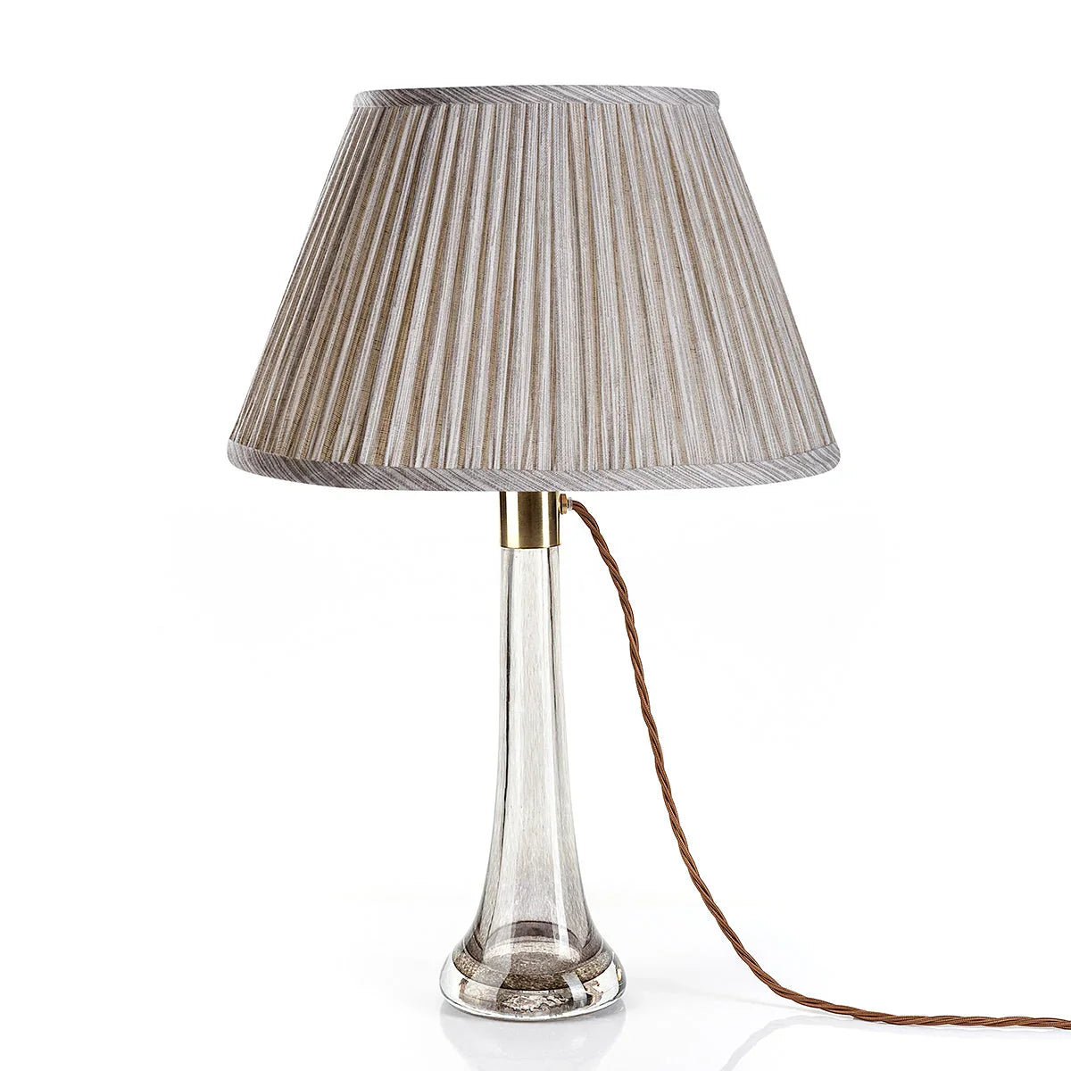 Fermoie grey lampshade on a glass lamp