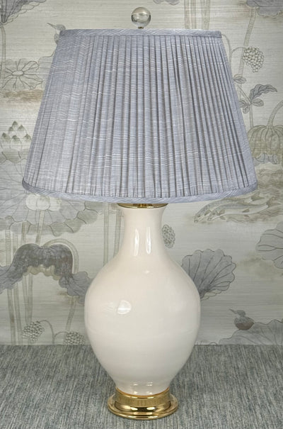 Large Clear Crystal Ball Finial in Polished Brass styled with a Fermoie strie lampshade on a Paul Schneider Athens ceramic lamp