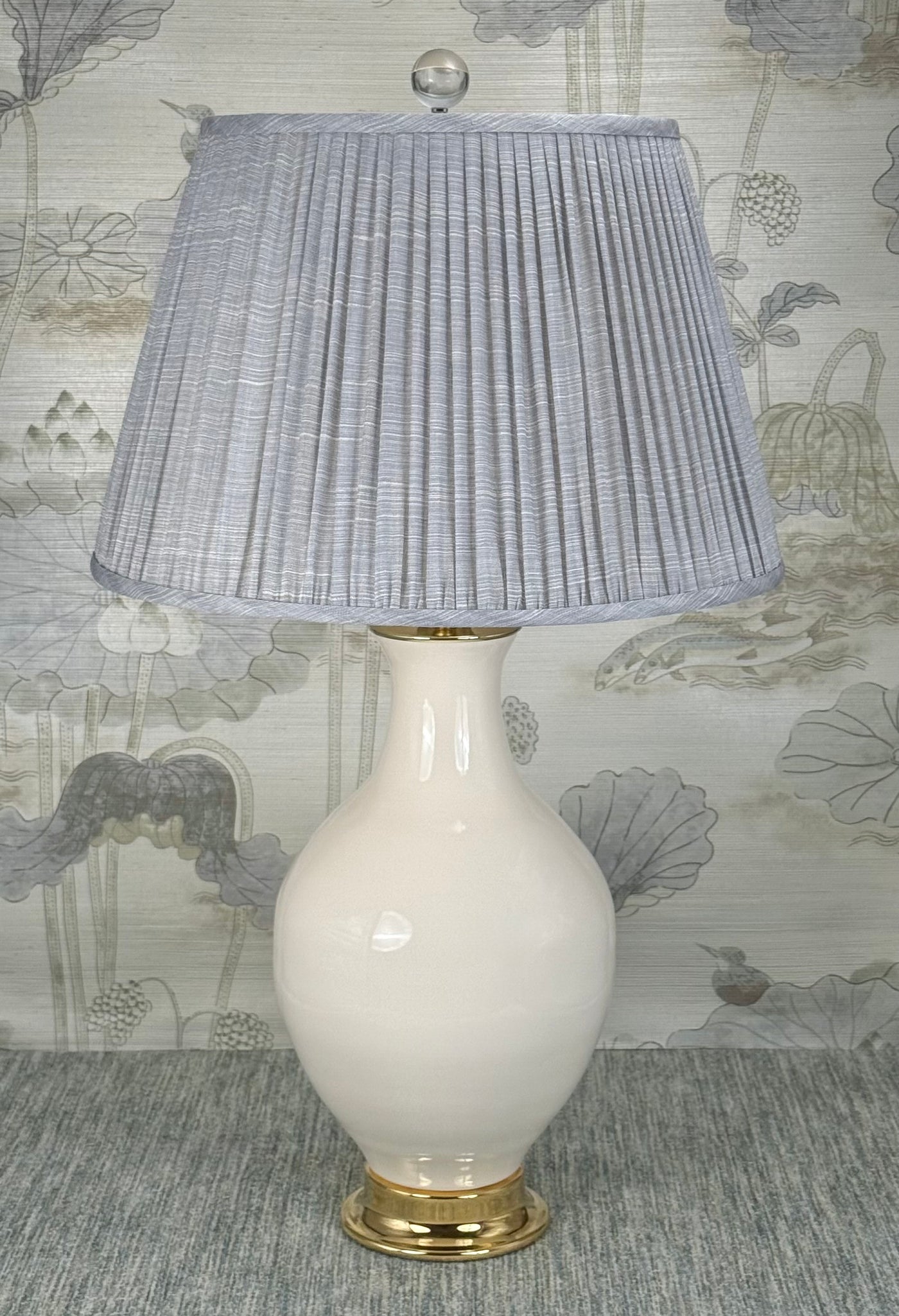 Large Clear Crystal Ball Finial in Polished Nickel styled with a Fermoie strie lampshade on a Paul Schneider Athens ceramic lamp