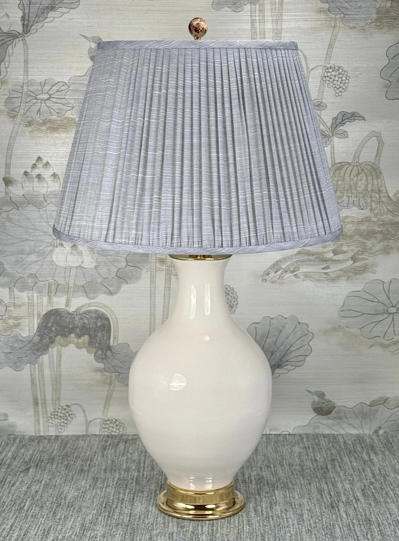 Leopard lamp finial styled with a Fermoie strie lampshade on a Paul Schneider Athens ceramic lamp