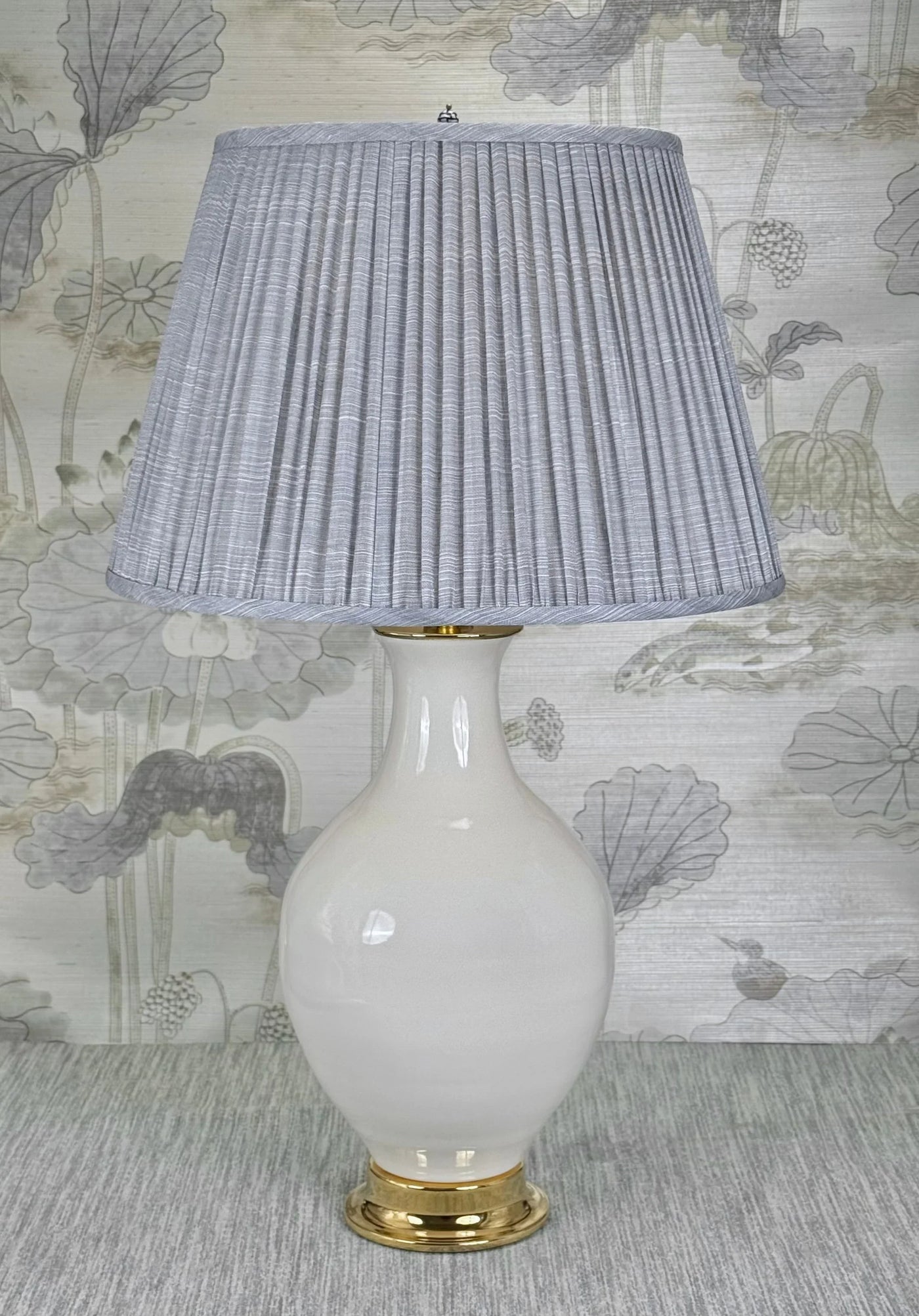 Mini Porcelain Blue and White lamp finial styled with a Fermoie strie lampshade on a Paul Schneider Athens ceramic lamp.