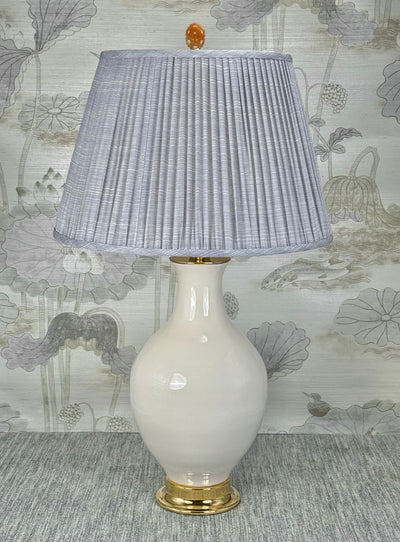 Orange Jasper Oval  lamp finial styled with a Fermoie strie lampshade on a Paul Schneider Athens ceramic lamp