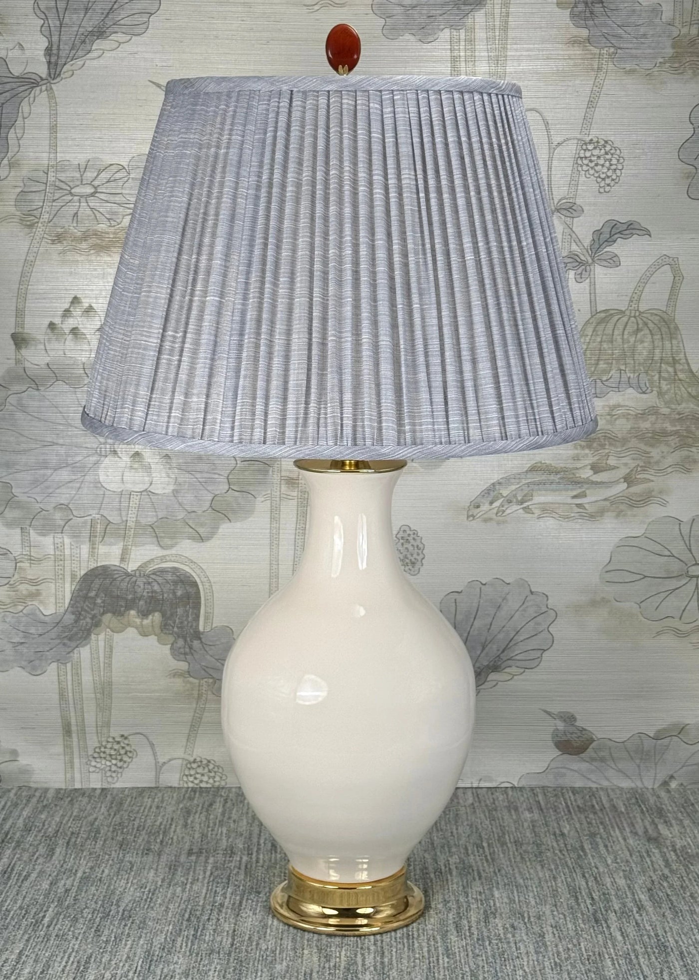 Oval Jasper lamp finial styled with a Fermoie strie lampshade on a Paul Schneider Athens ceramic lamp