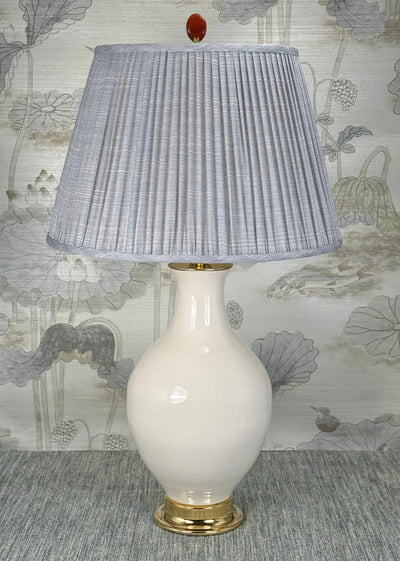 Oval Jasper lamp finial styled with a Fermoie strie lampshade on a Paul Schneider Athens ceramic lamp