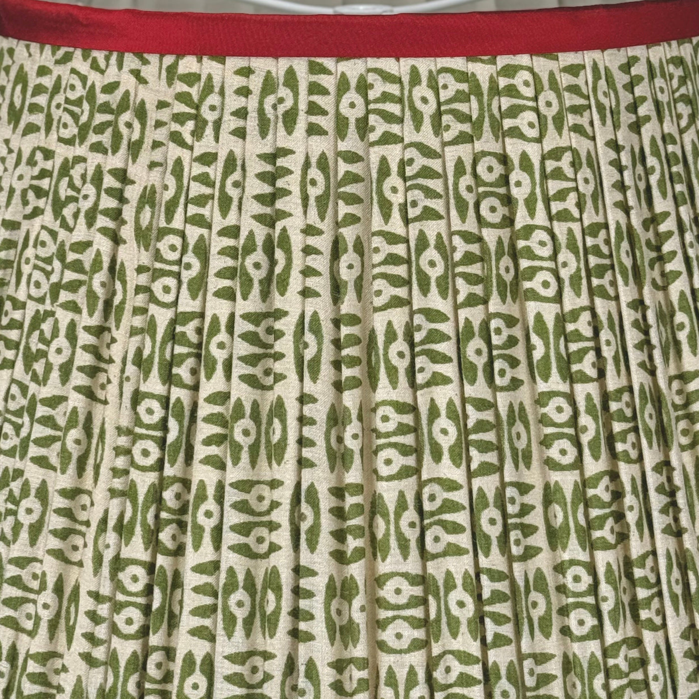 Penny Morrison Green on White Tribal Pleated Silk Lampshade with Red Trim close up