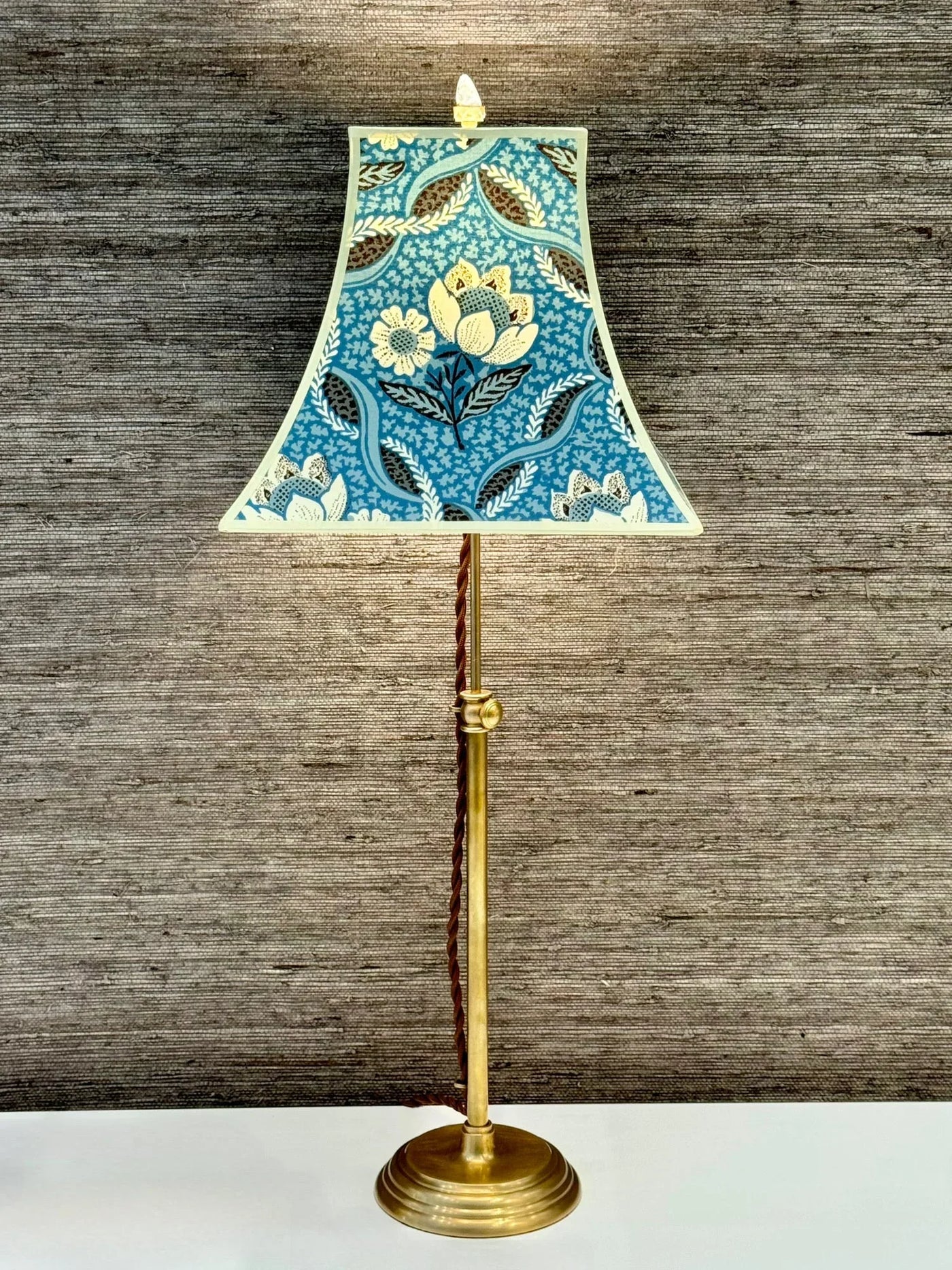 Pierre Frey Hardback Lampshade on a brass lamp