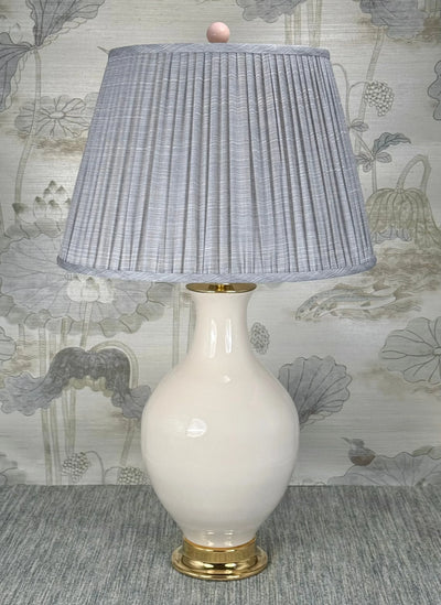 Pink Ceramic lamp finial styled with a Fermoie strie lampshade on a Paul Schneider Athens ceramic lamp