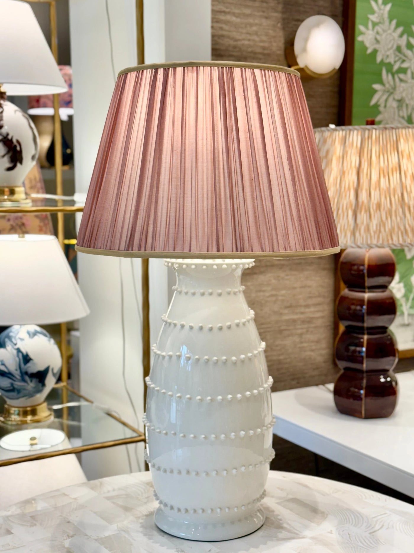 Pink sari lampshade with gold silk trim on Spitzy ceramic table lamp in ivory crackle glaze