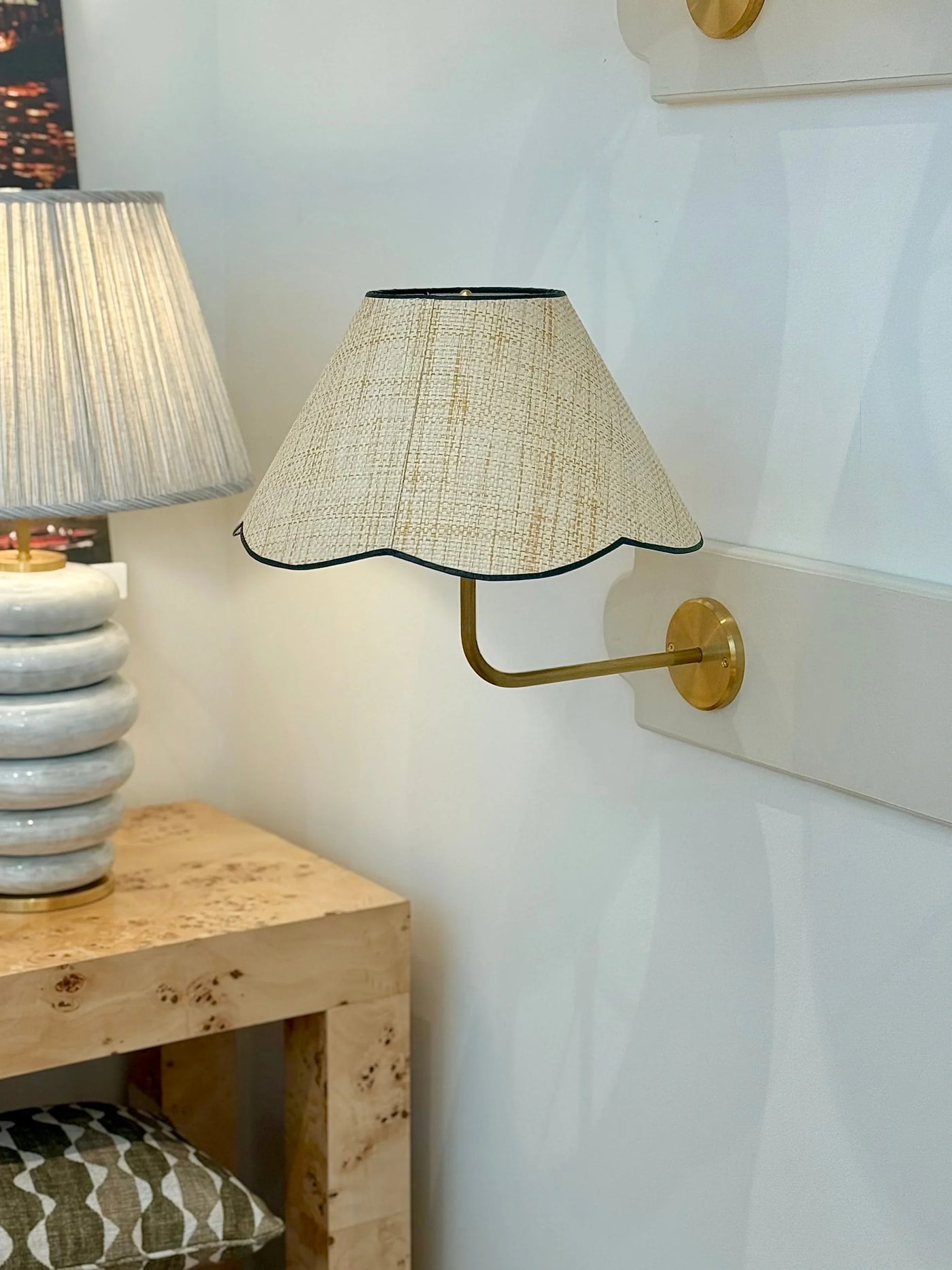Raffia Scalloped Flare Lampshade with Navy Trim on sconce 
