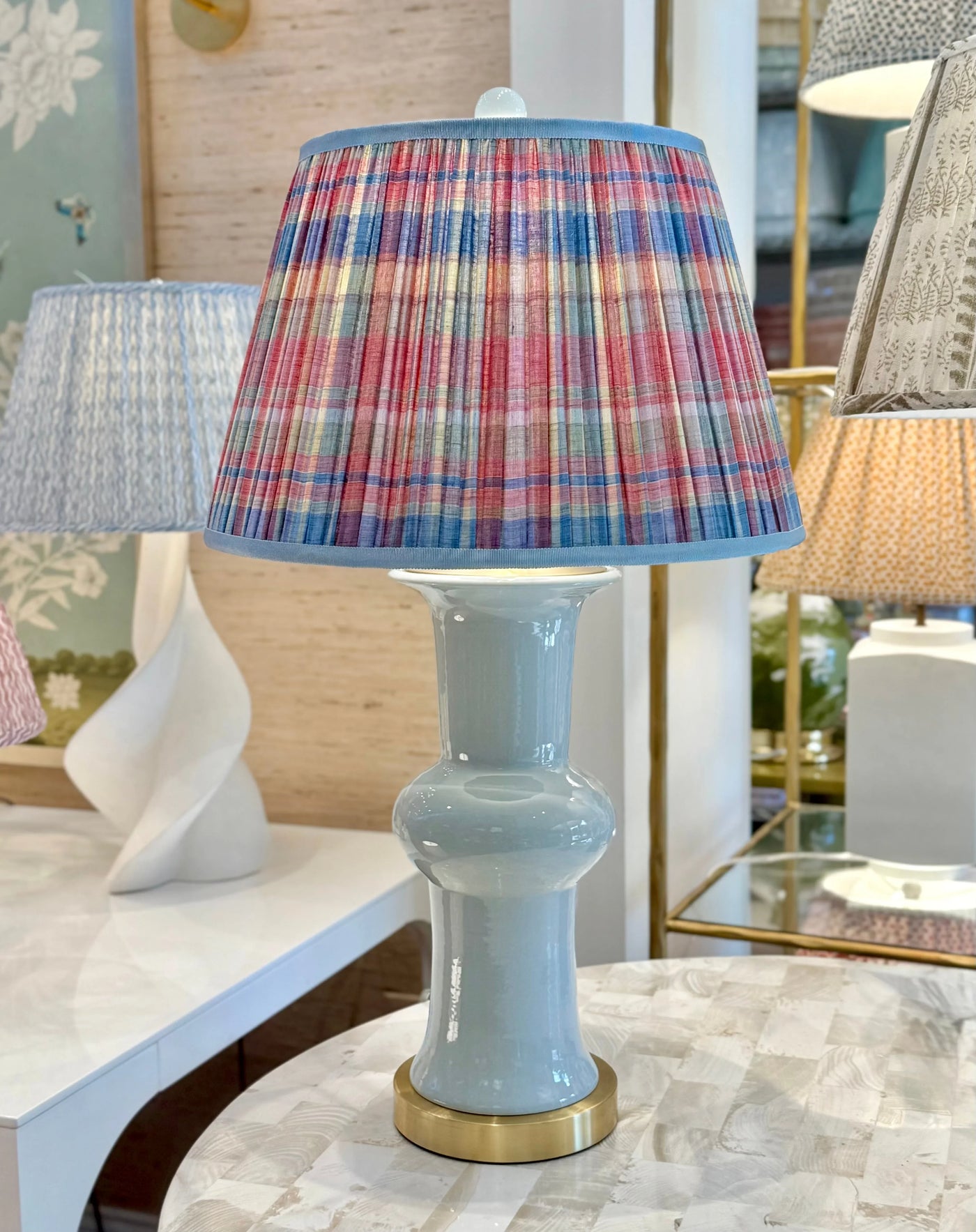 Vignette Red, Blue, Yellow & Green Plaid Lampshade with Grosgrain Trim on light blue lamp with gold base
