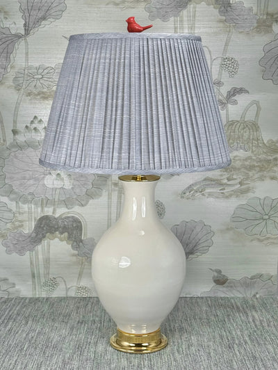 Red Porcelain Bird  lamp finial styled with a Fermoie strie lampshade on a Paul Schneider Athens ceramic lamp