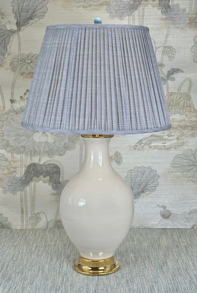 Sky blue lamp finial styled with a Fermoie strie lampshade on a Paul Schneider Athens ceramic lamp.