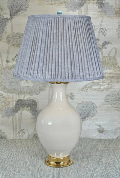 Sky blue lamp finial styled with a Fermoie strie lampshade on a Paul Schneider Athens ceramic lamp.