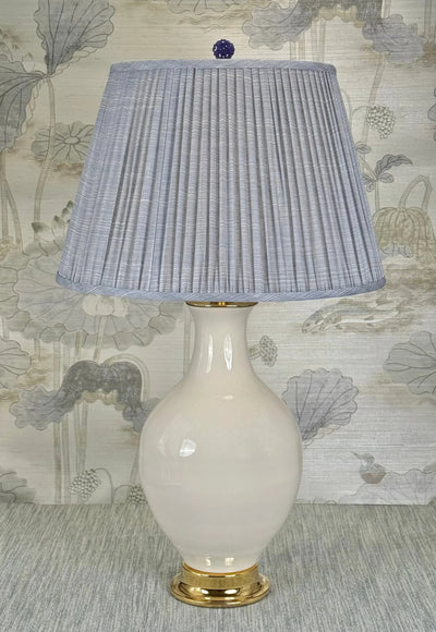 Small Blue Jade Dragons Carved lamp finial styled with a Fermoie strie lampshade on a Paul Schneider Athens ceramic lamp.