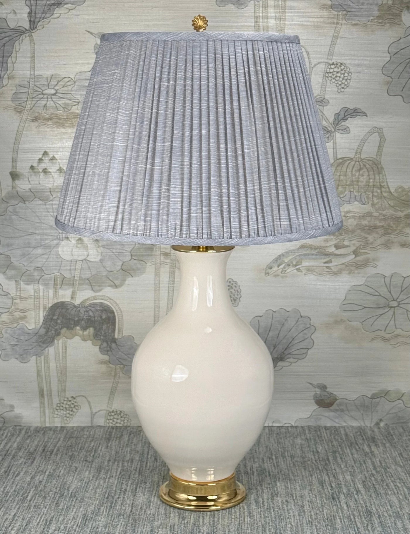 Small Brass Leaf    lamp finial styled with a Fermoie strie lampshade on a Paul Schneider Athens ceramic lamp