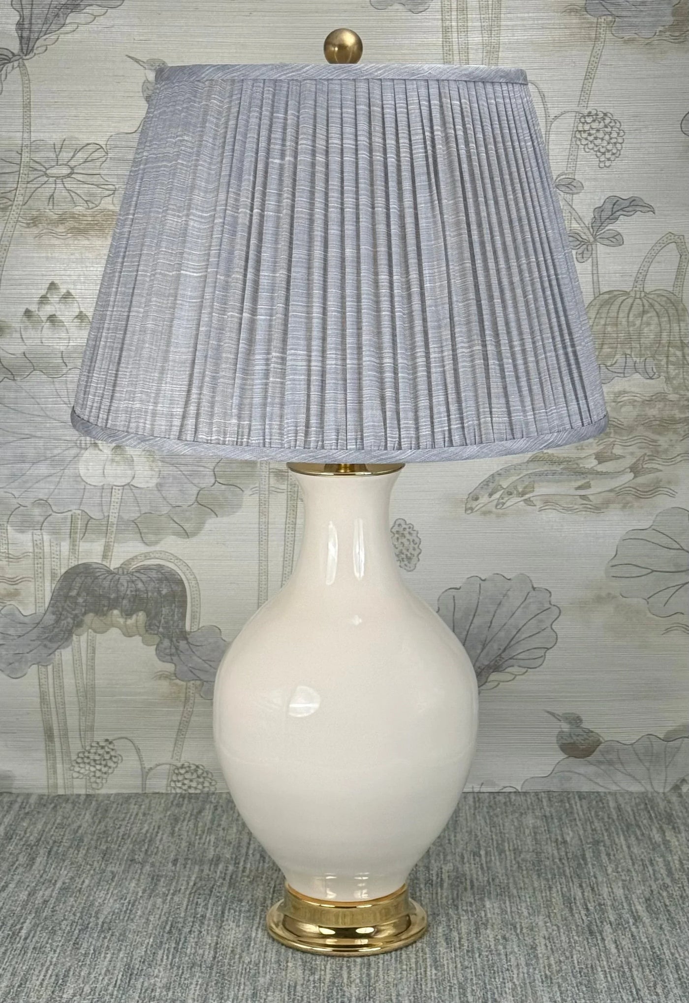 Solid Brass Ball Small lamp finial styled with a Fermoie strie lampshade on a Paul Schneider Athens ceramic lamp