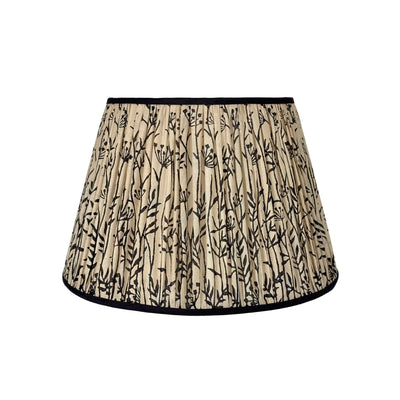 Pleated taupe silk lamp shade with black pattern and black trim