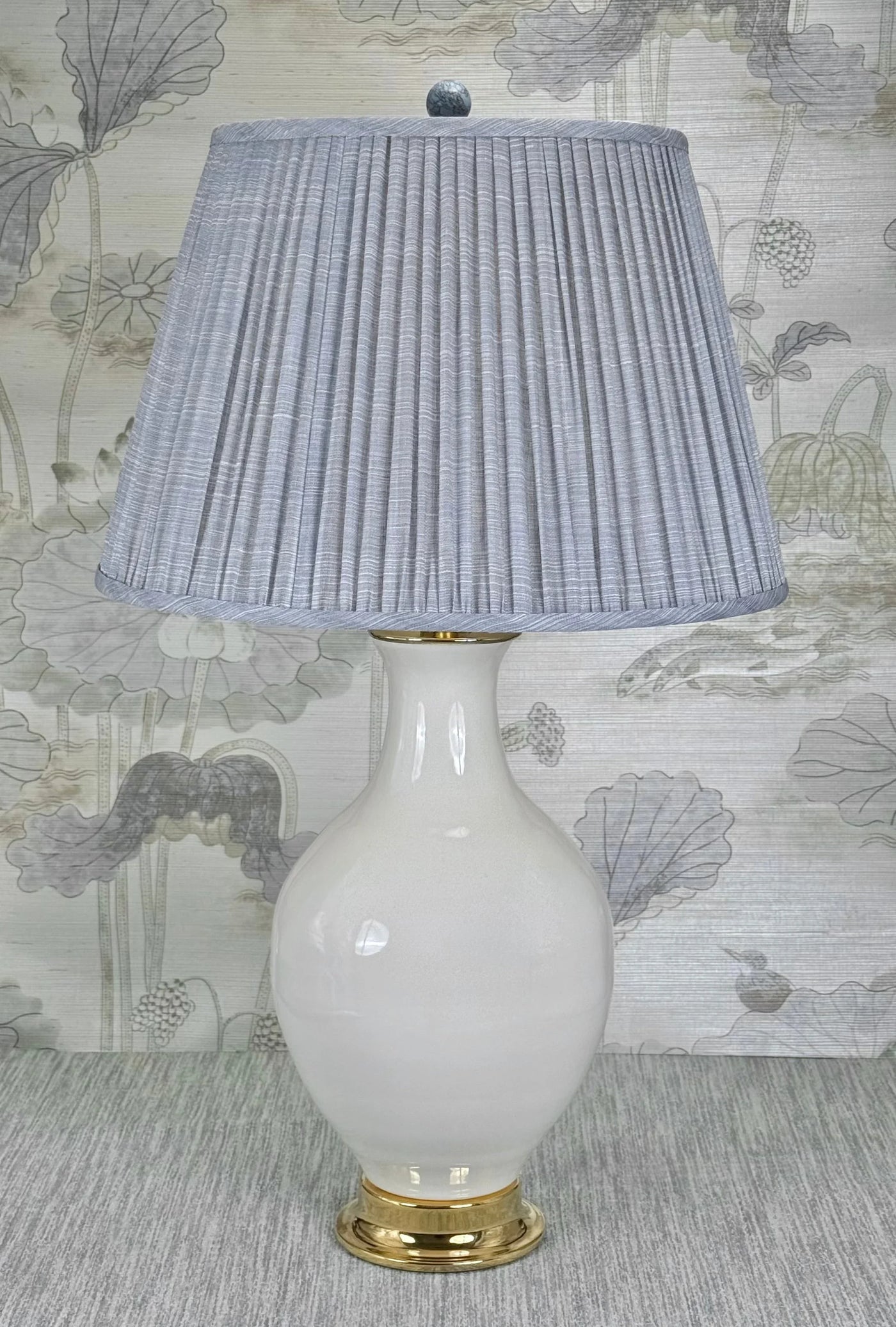 Turquoise and Nickel lamp finial styled with a Fermoie strie lampshade on a Paul Schneider Athens ceramic lamp.