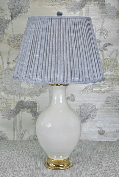 Turquoise and Nickel lamp finial styled with a Fermoie strie lampshade on a Paul Schneider Athens ceramic lamp.