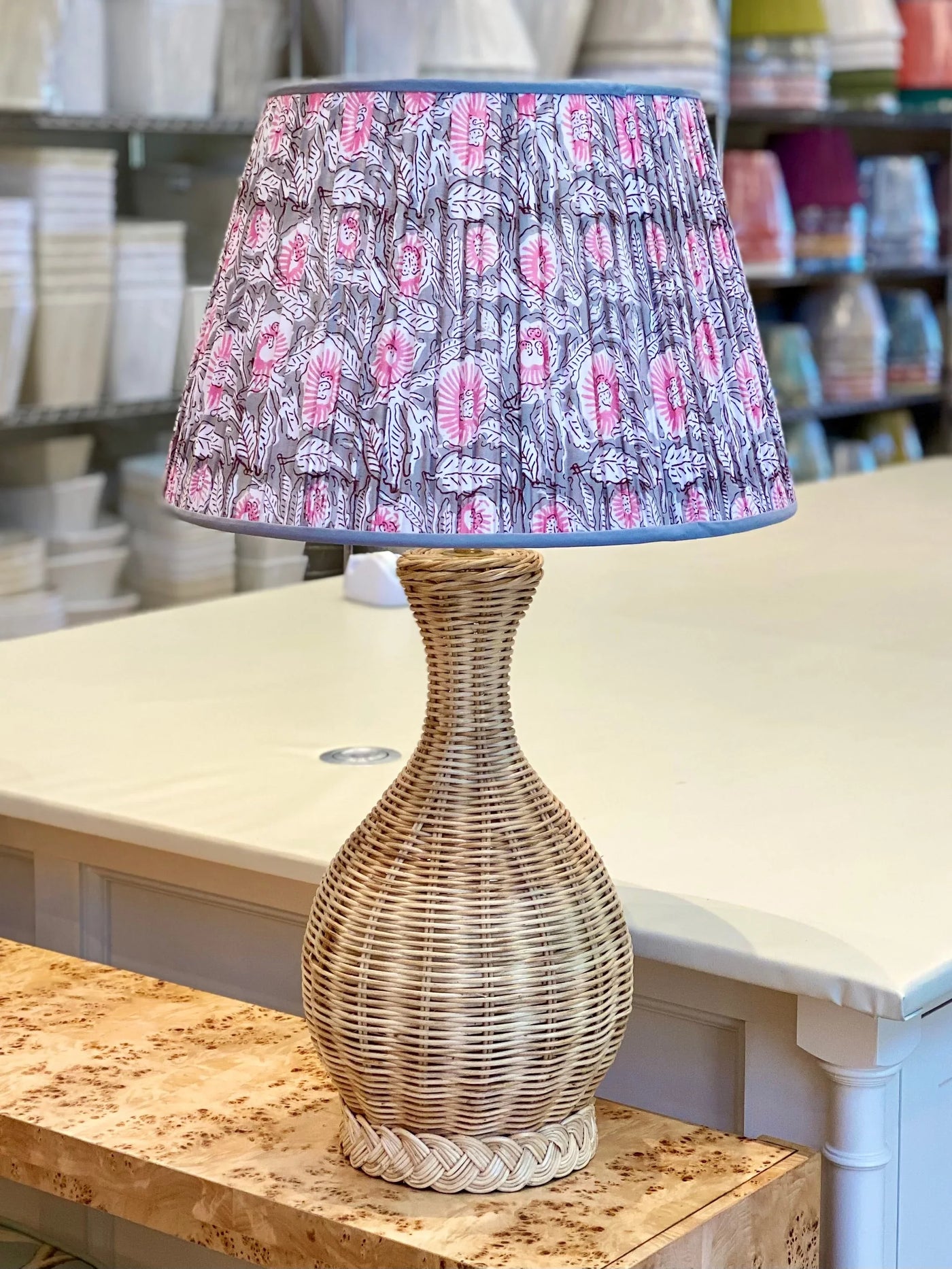 Whitehaven Rattan Table Lamp paired with Grey and Pink Block Print lampshade