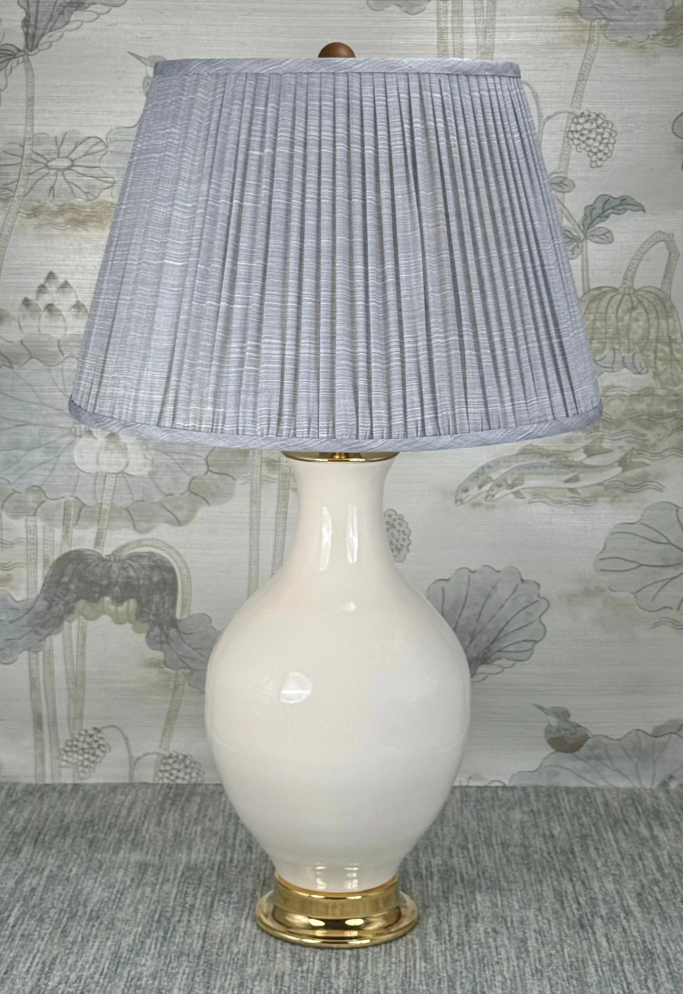 Wood Ball Walnut Finial Walnut Finish styled with a Fermoie strie lampshade on a Paul Schneider Athens ceramic lamp