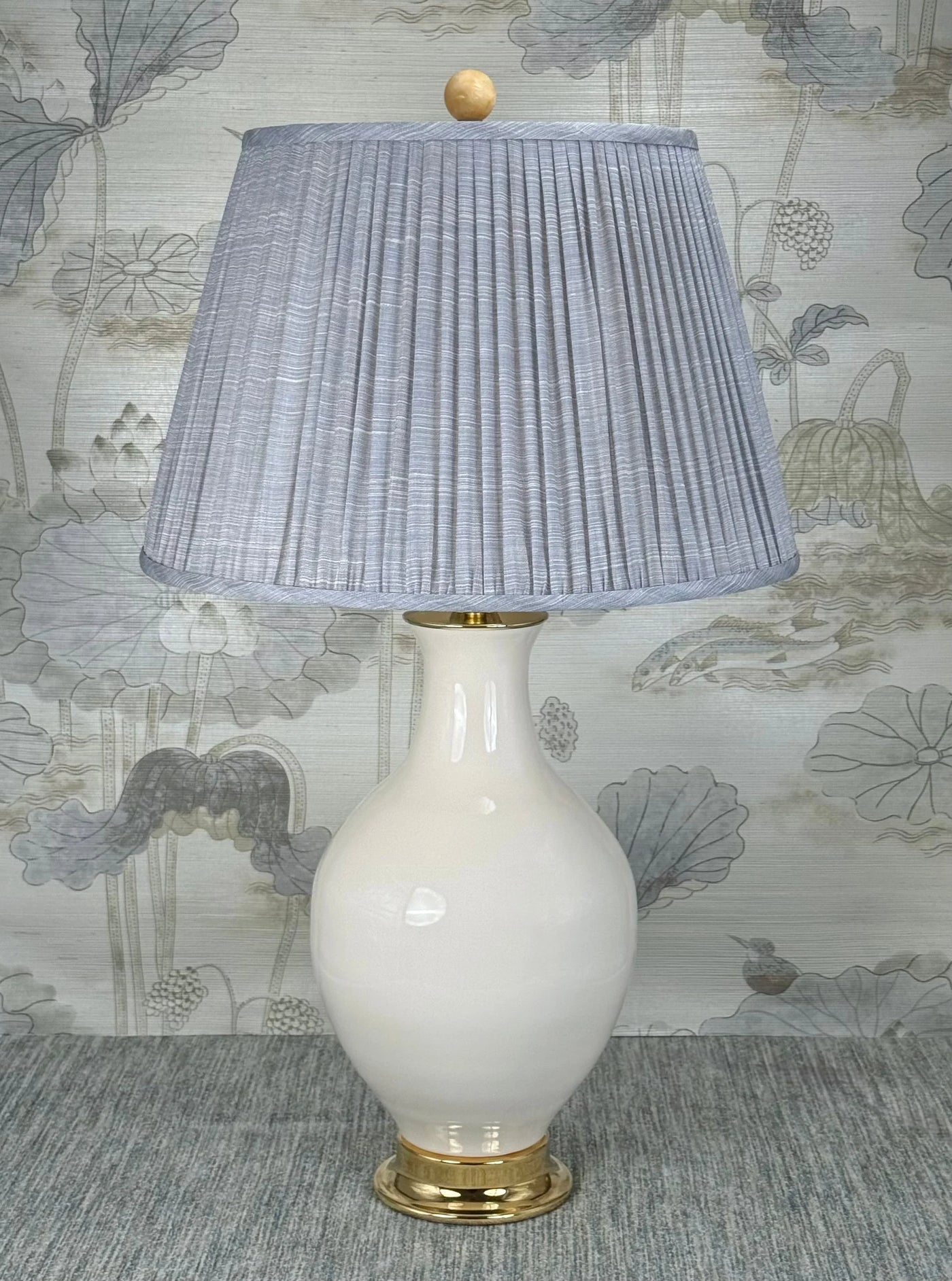 Yellow Jade Stone lamp finial styled with a Fermoie strie lampshade on a Paul Schneider Athens ceramic lamp.