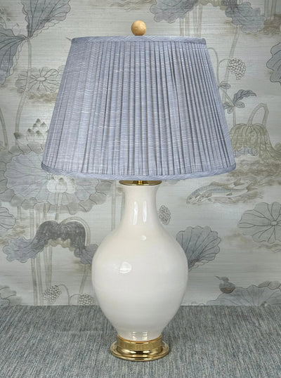 Yellow Jade Stone lamp finial styled with a Fermoie strie lampshade on a Paul Schneider Athens ceramic lamp.