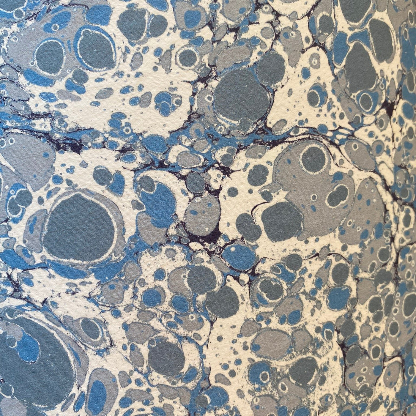 blue marbled paper close up