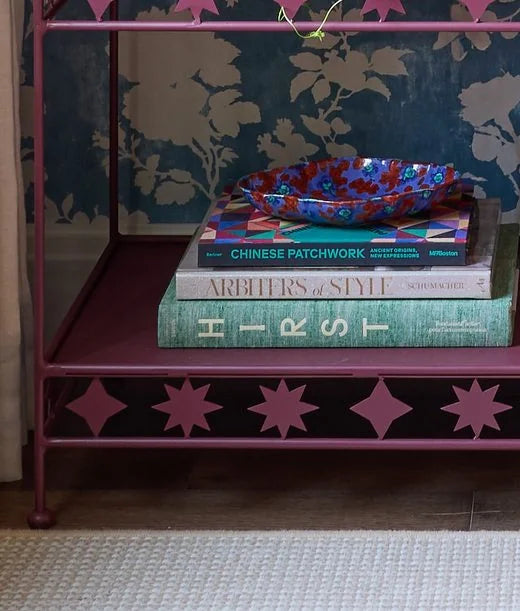 Pink nightstand with star cutouts