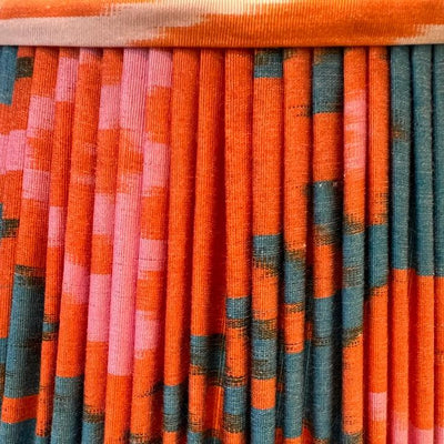 orange blue and pink ikat lampshade close up