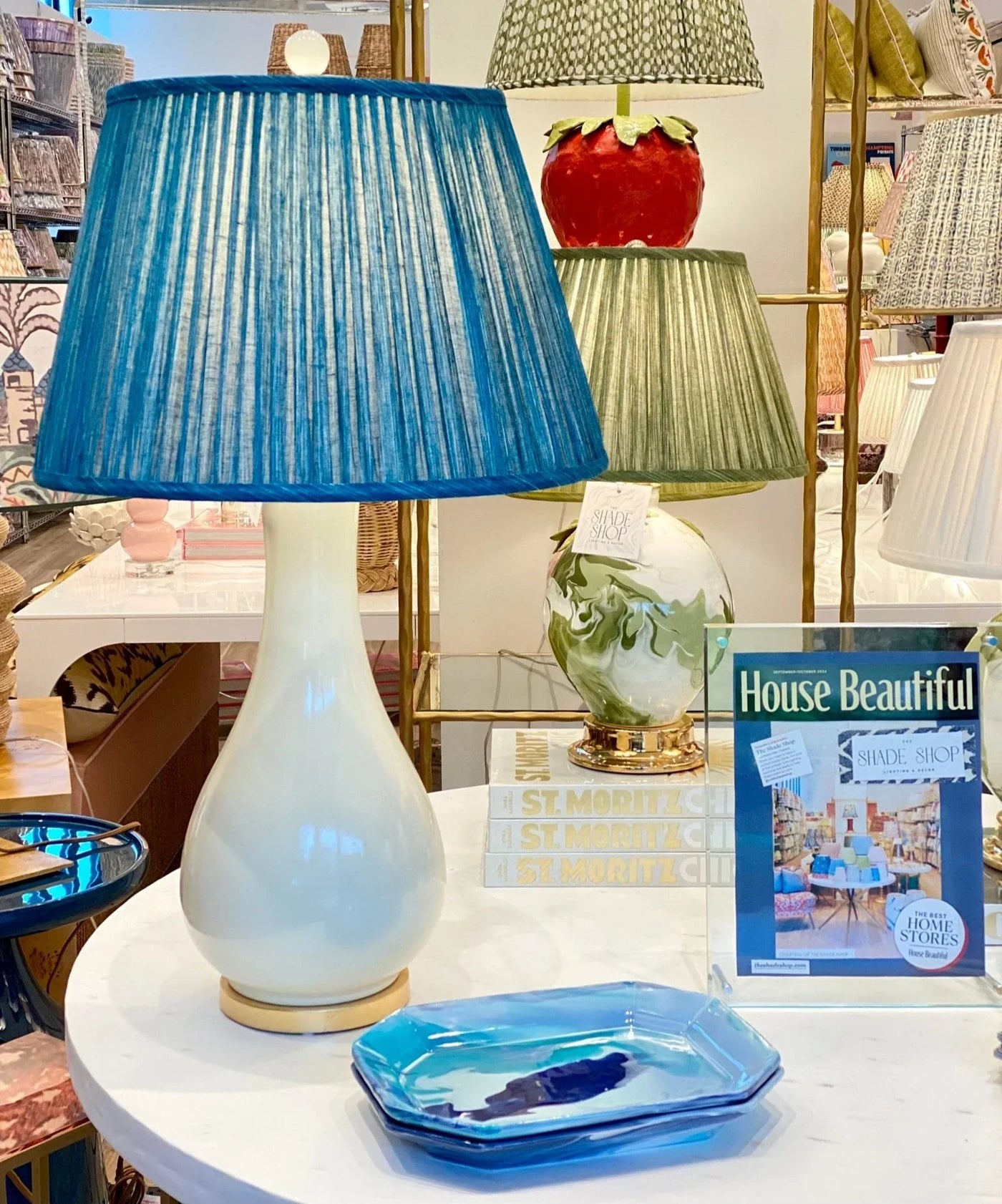 large ivory lamp with a blue lampshade