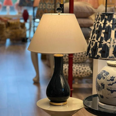 Navy lamp with a hardback lampshade