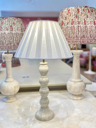 empire linen box pleat lampshade on a bone lamp