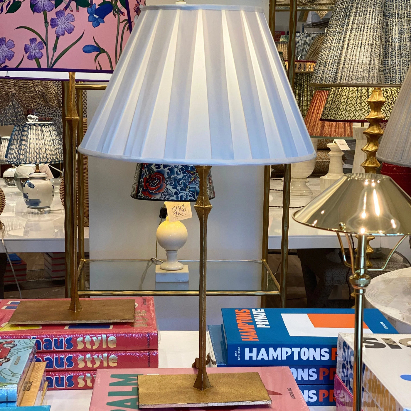 Empire silk box pleat lampshade on a brass Dauphine Lamp