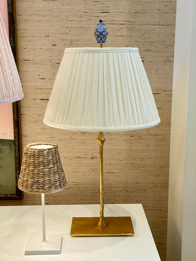 ginger jar finial on a brass lamp