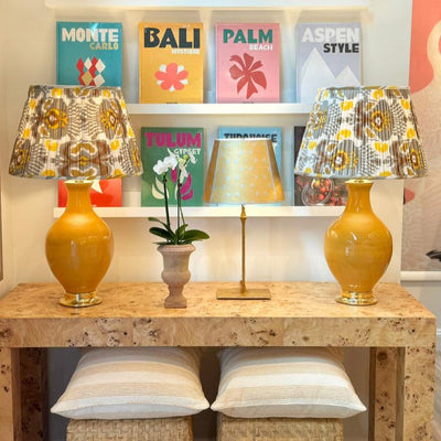 Gold lamps and ikat lampshades