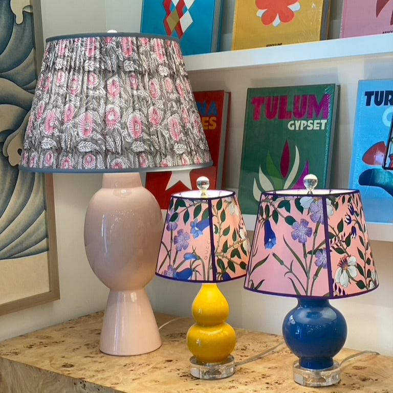 Grey and pink block print lampshade on a pink lamp