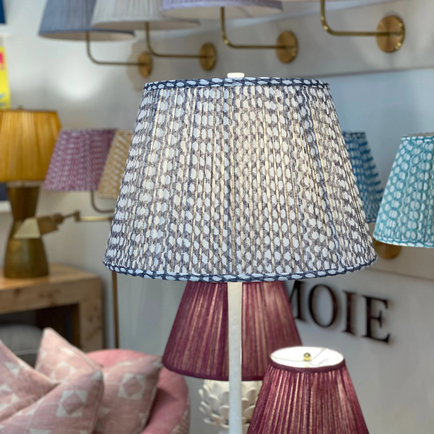 Fermoie Grey Wicker Lampshade on a white floor lamp