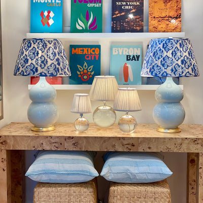blue lamps with blue and white ikat lampshades