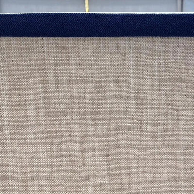 oatmeal linen with navy trim lampshade close up