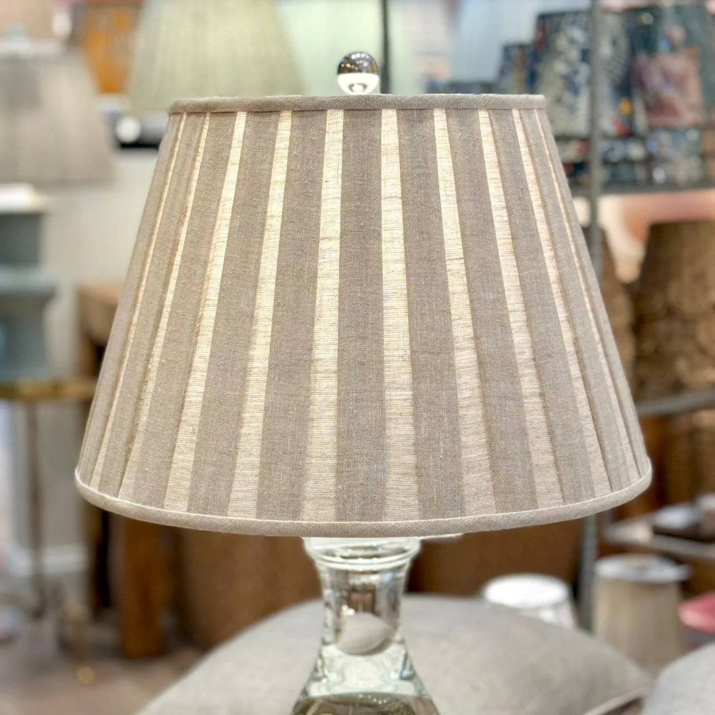 Oatmeal linen box pleat on a crystal lamp