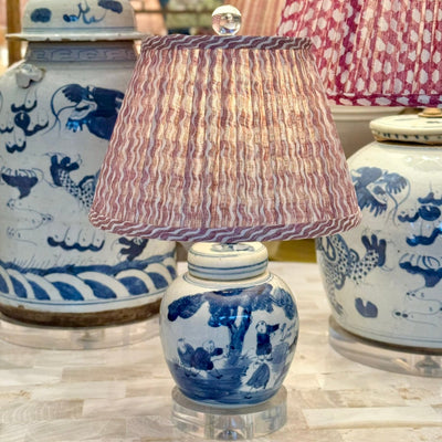 pink fermoie lampshade on a mini blue and white lamp