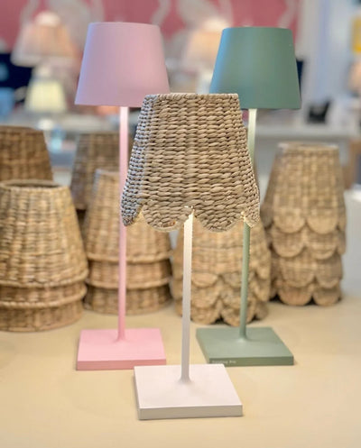 Scalloped seagrass shade on a cordless lamp