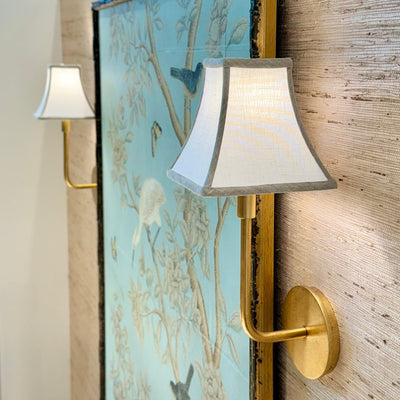Square bell sconce shade with oatmeal trim