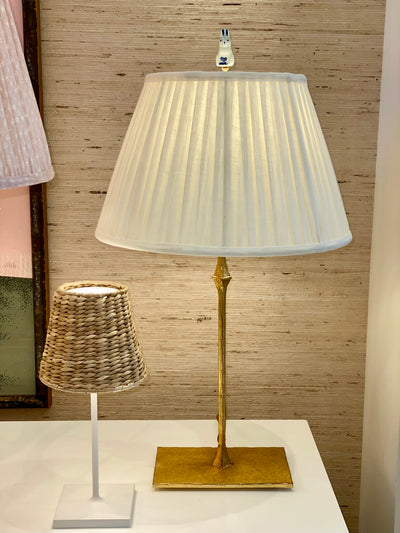 standing rabbit finial on a brass lamp