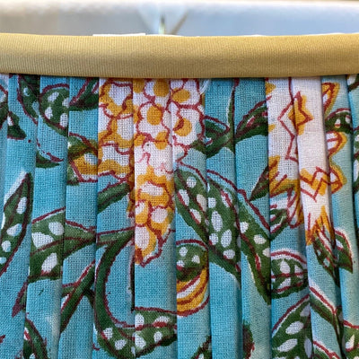 teal block print lampshade close up