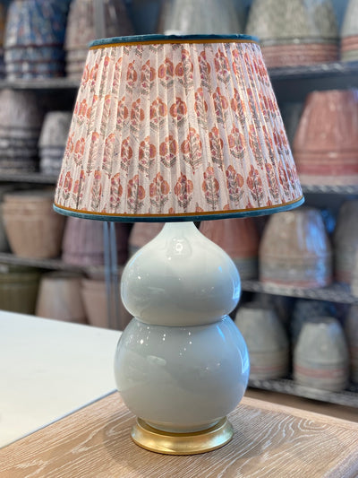 Block print lampshade on a blue Hwang Bishop Lamp